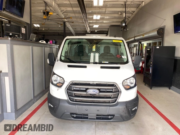 2020 Ford Transit Cargo with VIN 1FTBR1Y88LKB08471, listed as a IAAI auction lot 42297878 with 100,218 mi miles and . Bid and sale history available at DreamBid. Image 15.