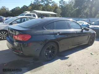 2015 BMW 4 Series 428i xDrive with VIN WBA4C9C51FD331771, listed as a Copart auction lot 82763504 with 124,945 mi miles and Salvage Title. Bid and sale history available at carsss.com. Image 3.