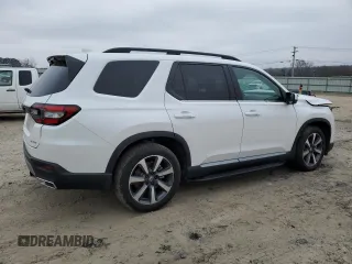 2025 Honda Pilot Elite with VIN 5FNYG1H82SB058680, listed as a Copart auction lot 42996425 with 9,890 mi miles and Salvage Title. Bid and sale history available at DreamBid. Image 3.