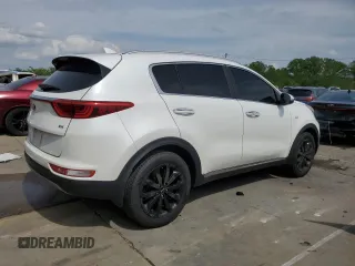 2019 Kia Sportage EX z VIN KNDPNCAC7K7522953, wystawiony jako Copart lot #54906835 z przebiegiem 128 011 mil mil oraz Szkoda całkowita • Salvage title. Historia ofert i sprzedaży dostępna na DreamBid. Obrazek 3.