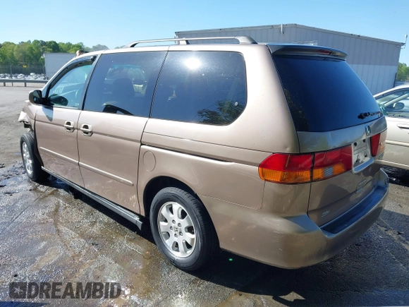 2003 Honda Odyssey EX-L z VIN 5FNRL180X3B055800, wystawiony jako IAAI lot #42053575 z przebiegiem 203 398 mil mil oraz . Historia ofert i sprzedaży dostępna na DreamBid. Obrazek 3.