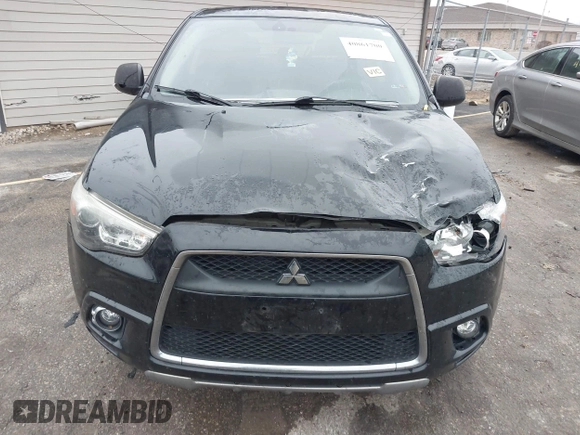 2011 Mitsubishi Outlander Sport SE with VIN JA4AP4AU6BZ012199, listed as a IAAI auction lot 40861700 with 125,016 mi miles. Bid and sale history available at carsss.com. Image 6.