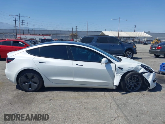 2023 Tesla Model 3 with VIN 5YJ3E1EA0PF621448, listed as a IAAI auction lot 42500155 with 26,589 mi miles and . Bid and sale history available at DreamBid. Image 14.