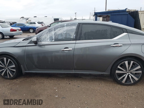 2019 Nissan Altima 2.5 Platinum with VIN 1N4BL4FVXKC174868, listed as a IAAI auction lot 41939991 with 63,022 mi miles. Bid and sale history available at carsss.com. Image 14.