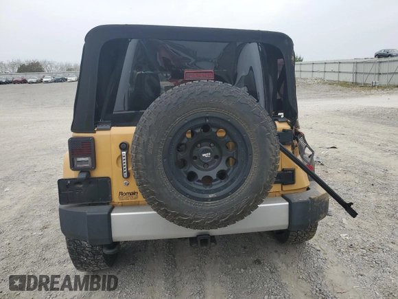 2014 Jeep Wrangler Sahara with VIN 1C4AJWBG8EL144691, listed as a Copart auction lot 71172514 with 111,322 mi miles and Salvage title. Bid and sale history available at DreamBid. Image 6.
