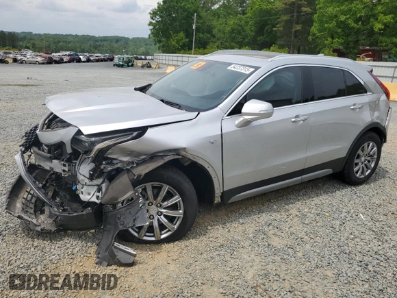 2021 Cadillac XT4 FWD Premium Luxury z VIN 1GYFZCR40MF000293, wystawiony jako Copart lot #58710565 z przebiegiem 49 721 mil mil oraz Szkoda całkowita • Salvage title. Historia ofert i sprzedaży dostępna na DreamBid. Obrazek 1.
