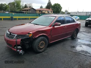 2009 Kia Optima LX z VIN KNAGE228895294033, wystawiony jako Copart lot #58221475 z przebiegiem 165 776 mil mil oraz Szkoda całkowita • Salvage title. Historia ofert i sprzedaży dostępna na DreamBid. Obrazek 1.