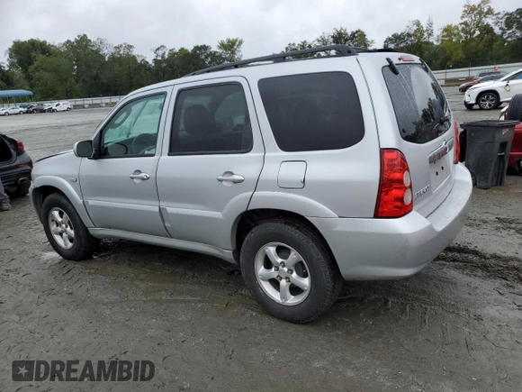 2006 Mazda Tribute i with VIN 4F2YZ02Z26KM14821, listed as a Copart auction lot 71718434 with 318,841 mi miles and Salvage Title. Bid and sale history available at carsss.com. Image 2.