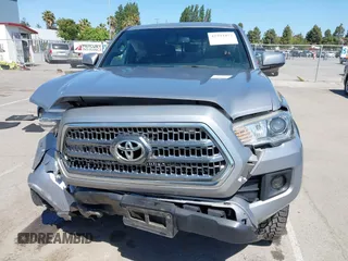 2016 Toyota Tacoma SR5 z VIN 3TMAZ5CNXGM019256, wystawiony jako IAAI lot #42294477 z przebiegiem 123 680 mil mil oraz . Historia ofert i sprzedaży dostępna na DreamBid. Obrazek 12.