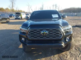 2022 Toyota Tacoma 4WD SR with VIN 3TMCZ5AN1NM479690, listed as a IAAI auction lot 41090208 with 26,481 mi miles. Bid and sale history available at carsss.com. Image 12.