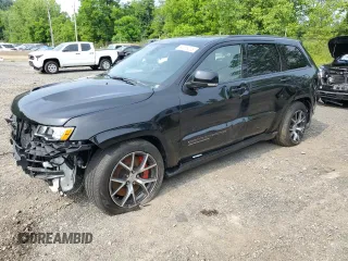 2021 Jeep Grand Cherokee Trackhawk with VIN 1C4RJFN94MC605884, listed as a Copart auction lot 61216275 with 7,652 mi miles and Salvage title. Bid and sale history available at DreamBid. Image 1.