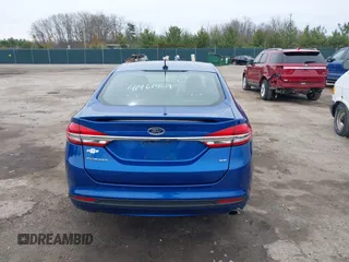 2017 Ford Fusion SE z VIN 3FA6P0H7XHR372552, wystawiony jako IAAI lot #41961909 z przebiegiem 139 199 mil mil oraz . Historia ofert i sprzedaży dostępna na DreamBid. Obrazek 16.
