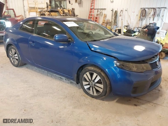 2013 Kia Forte Koup EX with VIN KNAFU6A29D5656754, listed as a IAAI auction lot 41067933 with NaN miles. Bid and sale history available at carsss.com. Image 1.