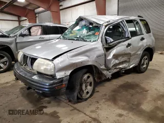 2004 Suzuki Vitara JX z VIN 2S3TD52V546100133, wystawiony jako Copart lot #72629154 z przebiegiem 186 597 mil mil oraz Tytuł czysty. Historia ofert i sprzedaży dostępna na DreamBid. Obrazek 1.