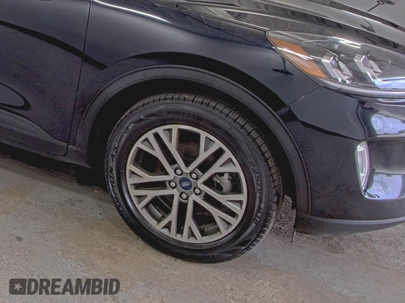 2021 Ford Escape SEL Hybrid with VIN 1FMCU9CZ0MUB25820, listed as a IAAI auction lot 42730204 with 66,443 mi miles and . Bid and sale history available at DreamBid. Image 27.