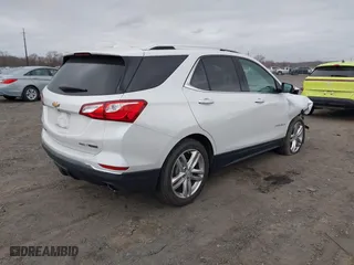 2018 Chevrolet Equinox Premier with VIN 2GNAXWEX6J6140692, listed as a IAAI auction lot 41729043 with 100,806 mi miles. Bid and sale history available at carsss.com. Image 4.
