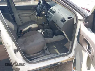 2006 Ford Focus S with VIN 1FAFP34N76W233950, listed as a IAAI auction lot 42596698 with 262,504 mi miles and . Bid and sale history available at DreamBid. Image 5.