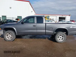 2004 Dodge Dakota SLT with VIN 1D7HG42N44S618405, listed as a IAAI auction lot 40895893 with 172,324 mi miles. Bid and sale history available at carsss.com. Image 14.