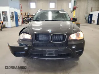 2011 BMW X5 35i z VIN 5UXZV4C52BL743475, wystawiony jako Copart lot #56238615 z przebiegiem 218 738 mil mil oraz Szkoda całkowita • Salvage title. Historia ofert i sprzedaży dostępna na DreamBid. Obrazek 5.