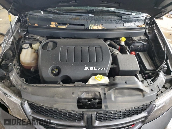 2014 Dodge Journey R/T z VIN 3C4PDCEGXET277243, wystawiony jako Copart lot #77973154 z przebiegiem 143 766 mil mil oraz Szkoda całkowita • Salvage title. Historia ofert i sprzedaży dostępna na DreamBid. Obrazek 12.