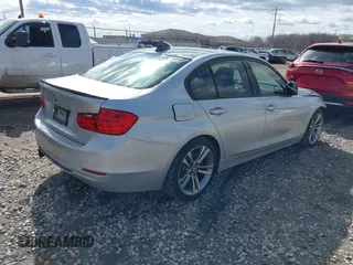 2015 BMW 3 Series 328i with VIN WBA3A5C55FF609490, listed as a IAAI auction lot 42006008 with 110,239 mi miles. Bid and sale history available at carsss.com. Image 4.