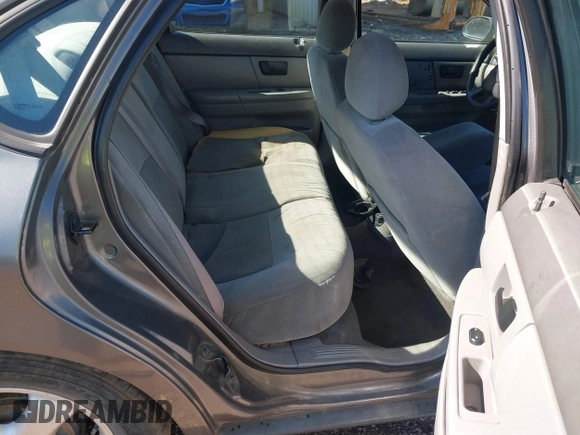 2005 Ford Taurus SE with VIN 1FAFP532X5A272398, listed as a IAAI auction lot 42001798 with 159,199 mi miles. Bid and sale history available at carsss.com. Image 8.