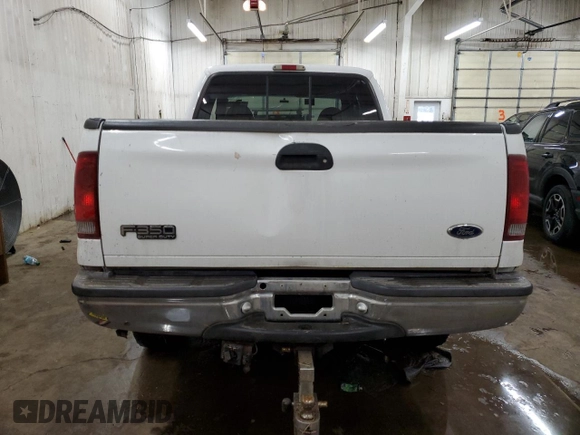 2000 Ford F-350 XL with VIN 1FTSX31F9YED25253, listed as a Copart auction lot 85926774 with 141,139 mi miles and Salvage Title. Bid and sale history available at DreamBid. Image 6.