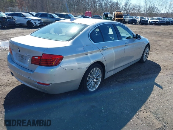 2014 BMW 5 Series 528i xDrive with VIN WBA5A7C58ED617131, listed as a IAAI auction lot 41749651 with 117,954 mi miles and . Bid and sale history available at DreamBid. Image 4.