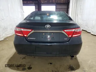 2015 Toyota Camry XLE with VIN 4T1BF1FK3FU077674, listed as a Copart auction lot 52679985 with 128,417 mi miles and Salvage Title. Bid and sale history available at DreamBid. Image 6.