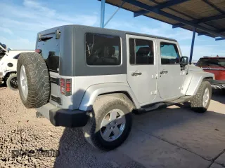 2010 Jeep Wrangler Unlimited Sahara with VIN 1J4HA5H13AL184449, listed as a Copart auction lot 43421945 with 176,725 mi miles and Salvage Title. Bid and sale history available at carsss.com. Image 3.