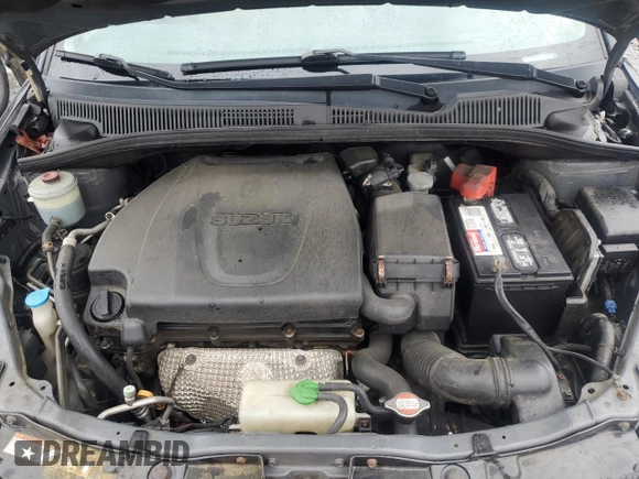 2011 Suzuki SX4 LE z VIN JS2YC5A28B6300625, wystawiony jako Copart lot #54044155 z przebiegiem 179 269 mil mil oraz Szkoda całkowita • Salvage title. Historia ofert i sprzedaży dostępna na DreamBid. Obrazek 11.