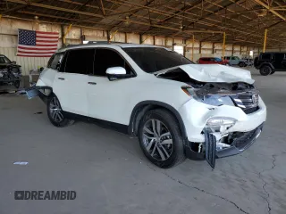 2018 Honda Pilot Touring с VIN 5FNYF6H98JB053524, выставлен на аукционе Copart как лот 61447785 с пробегом 114 942 миль миль и Списание • Salvage title. История ставок и продаж доступна на DreamBid. Изображение 4.