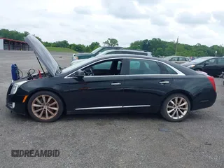 2013 Cadillac XTS Luxury z VIN 2G61P5S34D9183065, wystawiony jako IAAI lot #42665741 z przebiegiem 209 585 mil mil oraz . Historia ofert i sprzedaży dostępna na DreamBid. Obrazek 15.