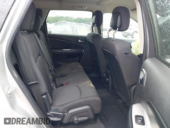 2013 Dodge Journey Canada Value z VIN 3C4PDCABXDT563439, wystawiony jako IAAI lot #42227899 z przebiegiem 213 199 mil mil oraz . Historia ofert i sprzedaży dostępna na DreamBid. Obrazek 8.