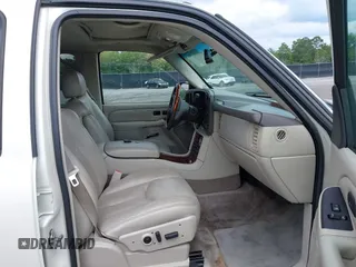 2005 Cadillac Escalade z VIN 1GYEK63N55R123817, wystawiony jako IAAI lot #42263549 z przebiegiem 297 279 mil mil oraz . Historia ofert i sprzedaży dostępna na DreamBid. Obrazek 5.