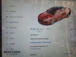 2013 Tesla Model S with VIN 5YJSA1DN0DFP08399, listed as a Copart auction lot 58848335 with 162,476 mi miles and Clean title. Bid and sale history available at DreamBid. Image 9.