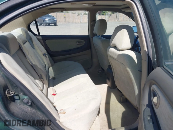 2000 Nissan Maxima GXE z VIN JN1CA31A8YT007617, wystawiony jako IAAI lot #42479039 z przebiegiem 165 950 mil mil oraz . Historia ofert i sprzedaży dostępna na DreamBid. Obrazek 8.