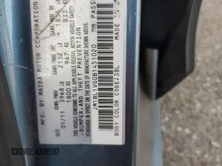 2011 Mazda 3 i Touring with VIN JM1BL1VG0B1451020, listed as a Copart auction lot 55887435 with Not Provided miles and Salvage Title. Bid and sale history available at DreamBid. Image 13.