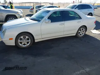 2002 Mercedes-Benz E-Class with VIN WDBJF65J22B455901, listed as a IAAI auction lot 41679008 with 153,854 mi miles. Bid and sale history available at carsss.com. Image 6.