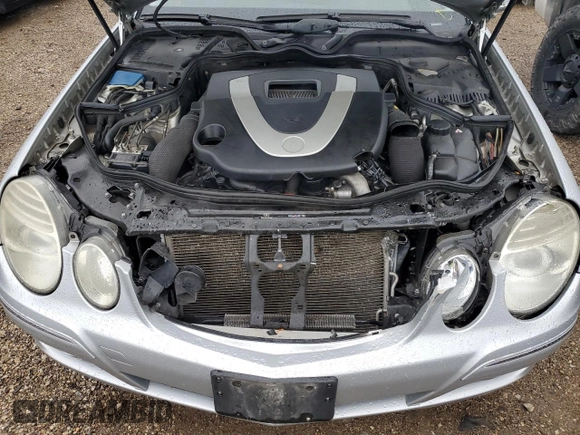 2007 Mercedes-Benz E 550 with VIN WDBUF72X77B059322, listed as a Copart auction lot 72271754 with 149,204 mi miles and Salvage Title. Bid and sale history available at DreamBid. Image 11.