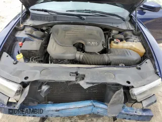2014 Dodge Charger SXT z VIN 2C3CDXHG2EH184196, wystawiony jako Copart lot #55803035 z przebiegiem 140 707 mil mil oraz Szkoda całkowita • Salvage title. Historia ofert i sprzedaży dostępna na DreamBid. Obrazek 11.