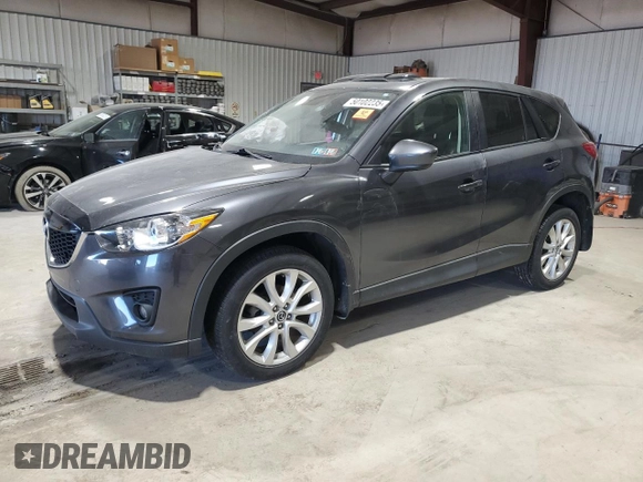 2014 Mazda CX-5 Grand Touring with VIN JM3KE4DY3E0337732, listed as a Copart auction lot 50102235 with 143,109 mi miles and Salvage Title. Bid and sale history available at carsss.com. Image 1.