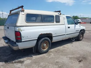 1996 Dodge 1500 z VIN 1B7HC16Y1TS630096, wystawiony jako IAAI lot #42095072 z przebiegiem 252 069 mil mil oraz . Historia ofert i sprzedaży dostępna na DreamBid. Obrazek 4.
