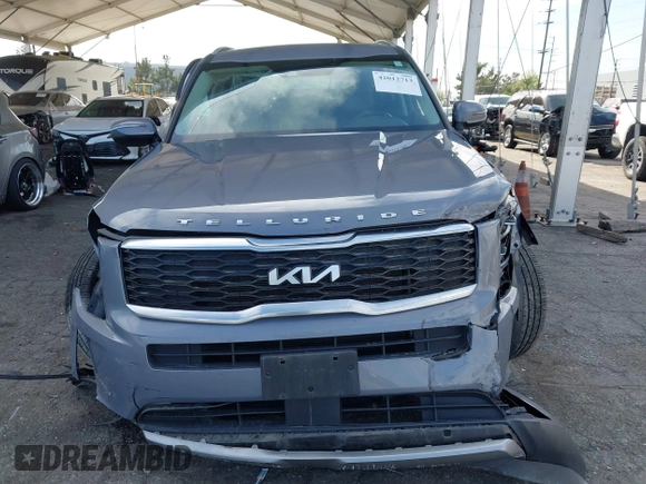2022 Kia Telluride S with VIN 5XYP6DHC4NG205678, listed as a IAAI auction lot 42012713 with 56,783 mi miles and . Bid and sale history available at DreamBid. Image 12.