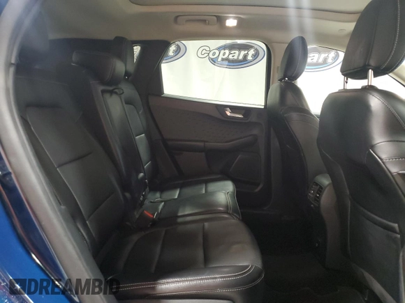 2020 Ford Escape Titanium z VIN 1FMCU9J98LUA93393, wystawiony jako Copart lot #65366925 z przebiegiem 74 750 mil mil oraz Czysty tytuł • Clean title. Historia ofert i sprzedaży dostępna na DreamBid. Obrazek 11.