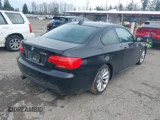 2013 BMW 3 Series 328i xDrive with VIN WBAKF3C50DJ385511, listed as a IAAI auction lot 41795976 with 134,057 mi miles. Bid and sale history available at carsss.com. Image 4.