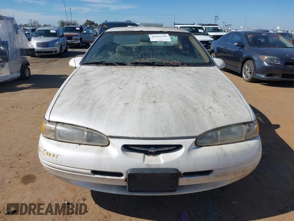 1996 Ford Thunderbird LX z VIN 1FALP62W3TH135238, wystawiony jako IAAI lot #41692746 z przebiegiem 136 464 mil mil oraz . Historia ofert i sprzedaży dostępna na DreamBid. Obrazek 6.