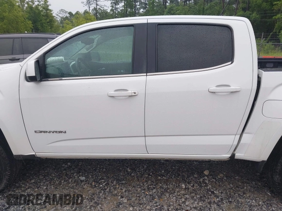 2018 GMC Canyon z VIN 1GTG5CE14J1134654, wystawiony jako IAAI lot #42203541 z przebiegiem 147 881 mil mil oraz . Historia ofert i sprzedaży dostępna na DreamBid. Obrazek 14.