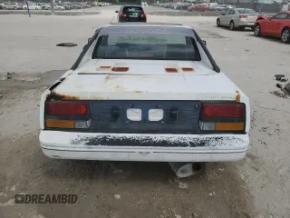 1986 Toyota MR2 z VIN JT2AW15C2G0049232, wystawiony jako Copart lot #47584895 z przebiegiem 185 369 mil mil oraz Tytuł czysty. Historia ofert i sprzedaży dostępna na DreamBid. Obrazek 6.
