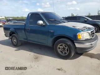 2000 Ford F-150 XL z VIN 3FTZF172XYMA81391, wystawiony jako Copart lot #62108855 z przebiegiem Nie podano mil oraz Szkoda całkowita • Salvage title. Historia ofert i sprzedaży dostępna na DreamBid. Obrazek 4.